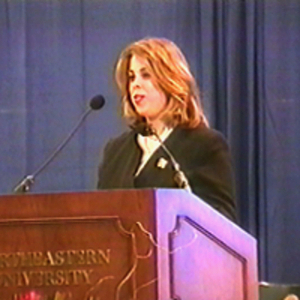 A woman speaking at the dedication of the Curry Student Center