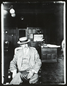 Portrait of Mr. A.H. Smith, seated, facing front, location unknown, June 25, 1909