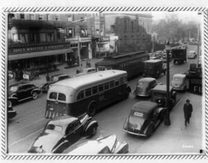 Traffic Boylston Street at Arlington with a store sign "Jones McDuffee & Stratton," Boston, Mass., 1940s