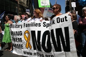 Marchers behind the banner for 'Military Families Speak Out' during protest against the war in Iraq