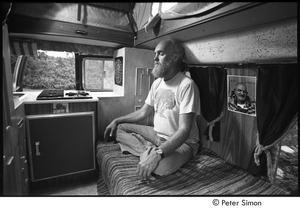 Ram Dass in his van, meditating