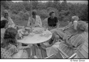 Ram Dass and dad at mum's: Ram Dass, Phyllis Alpert, Andrea Simon, George Alpert, unidentified, Ronni Simon, and unidentified, clockwise from top left, seated on a patio