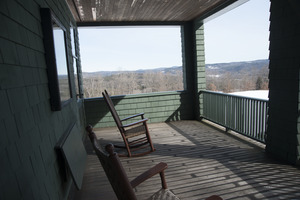 Front porch and rocking chairs at Naulakha, Rudyard Kipling's home from 1893-1896, in the snow