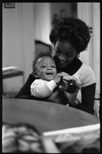Lorraine Swan feeding her infant son Che