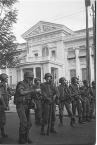 Riot police protecting "gialong palace"; Saigon.