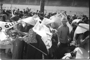 Funeral procession turns into a political demonstration against the Tran van Huong government. Demonstrators clash with paratroopers who arrest them; Saigon.