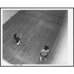 Two players in a game of racquetball