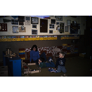 Boys building with blocks in a classroom setting