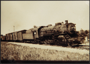 Engine 3018 with freight
