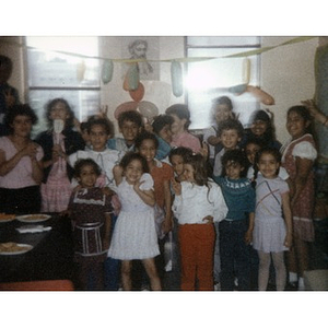 Group portrait of children, perhaps the children of the Escuelita Agüeybana day care center.