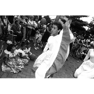 Woman performing a dance in the plaza during Festival Betances.