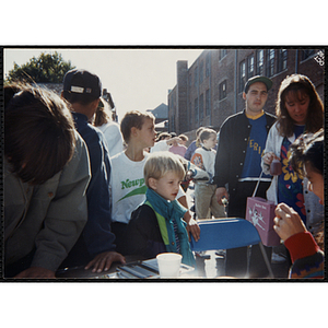 People congregate at a carnival