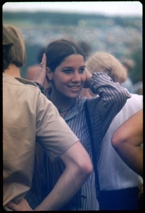 Young woman in the crowd at the Woodstock Festival