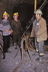 Diana Mara Henry with two miners