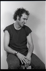 Studio portrait of Richard Safft, seated on a stool