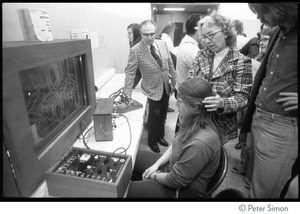 Demonstration of biofeedback machine (?) at the Kohoutek Celebration of Consciousness