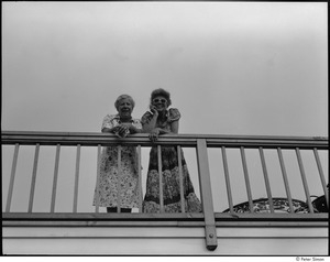 My Wedding: Andrea Simon, right, leaning on a railing with unidentified woman