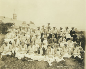 Class of 1920 reunion in chef aprons and hats