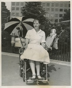 Woman in specially equipped wheelchair