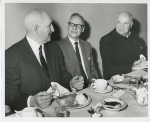 Sam Farnsworth, Fred Leurs and Reverend Conroy at Thanksgiving celebration