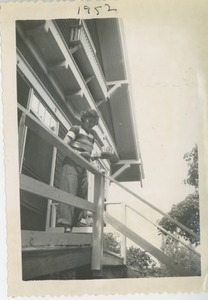 Bernice Kahn on porch with serving dish