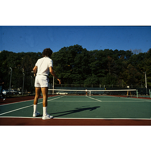 Tennis players in the midst of a game