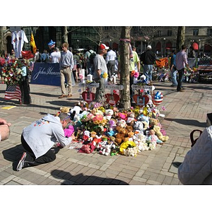 Photographer at Boston Marathon Copley Square memorial