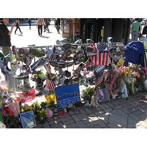 Running shoes at Boston Marathon Copley Square memorial