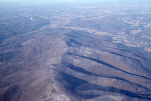 Oblique aerial photos accompanying 22 Dec 1994 Col-East air photo mission. 6. Taconic Range (center) in Pownal, VT.