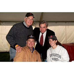 President Freeland poses with members of the NU community during Homecoming festivities