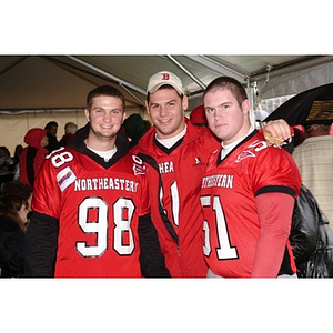 Northeastern football players pose before the Homecoming game