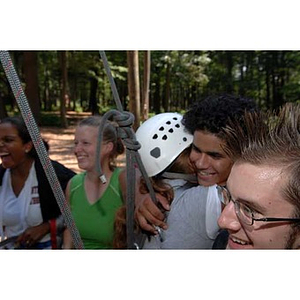 A group at the Torch Scholars Project Adventure Ropes Course