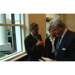 Senator Kennedy reads over his notes for the press conference on student financial aid cuts