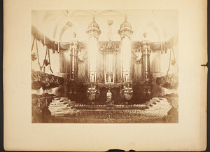 Close-up view of the "Great" pipe organ and platform in Boston Music Hall, as decorated for Charles Sumner's memorial service