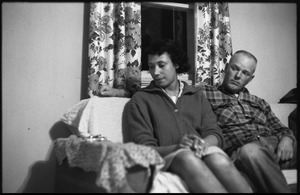 Mildred and Richard Loving seated on a couch: three-quarter length portrait