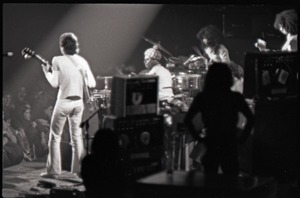 Santana concert at the Springfield Civic Center: Carlos Santana (back to camera) and band in performance