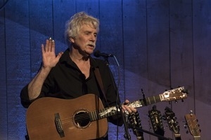 Tom Rush (guitar) talking between songs in concert at the Payomet Performing Arts Center