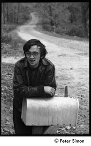 Raymond Mungo leaning on the mailbox, Montague Farm commune