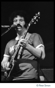Jerry Garcia (Grateful Dead) playing guitar in concert at the Ark