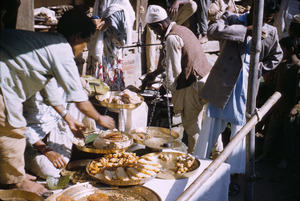 Sweets displayed on scales in market