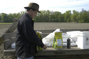 Lazy Acres Farm (Zuchowski Farm): Allan Zuchowski loading corn seed into his planter