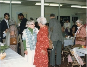 Margaret Holt (left) talking to Arky Markham at the Margaret Holt dinner, First Congregational Church, Amherst