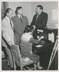 Oiva Juvala, Jacob M. Leiman, Dr. Herbert Rusalem, and Barbara Sasso demonstrating a switchboard