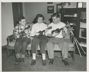 Clients playing ukuleles