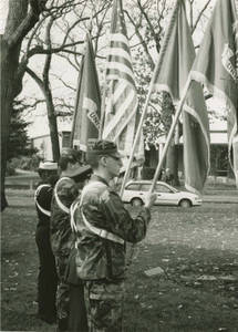 Four Soldiers with Flags on Veteran's Day