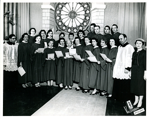 Fr. John Silva with choir
