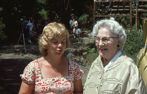 Pam Art and Ella Rosenburg chat at the Moon Barn Raising at entrance to Hopkins Forest on 2 August 1975.