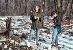 Students in ENVI 102 - Introduction to Environmental Science taking notes in Moon Lot.
