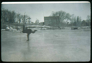 Saugus Center, Percy Cutter skating on Saugus river, Scott mill in back