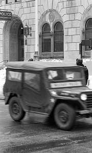 Military Police vehicle in front of Boston Police Headquarters on Berkeley Street